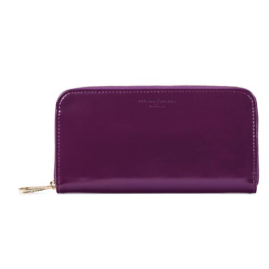 Continental Clutch Zip Wallet in Violet Patent from Aspinal of London