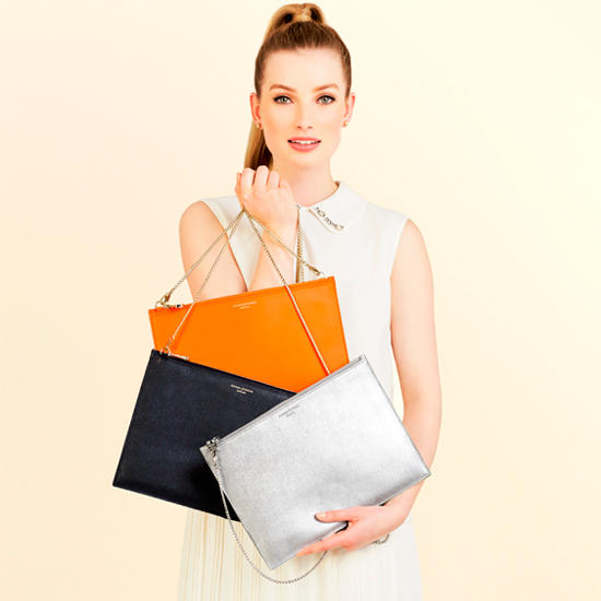 Soho Double Sided Clutch in Smooth Chanterelle & Natural Python Print from Aspinal of London