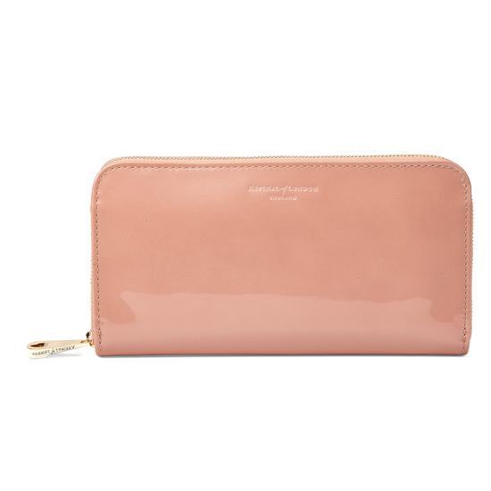 Continental Clutch Zip Wallet in Rose Gold Patent from Aspinal of London