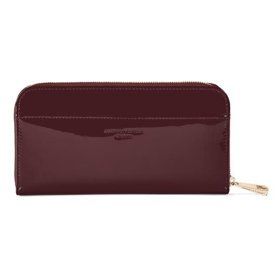 Continental Clutch Zip Wallet in Deep Shine Cherry Patent from Aspinal of London