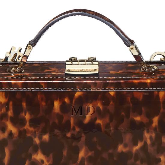 Mini Trunk Clutch in Deep Shine Tortoiseshell Patent from Aspinal of London